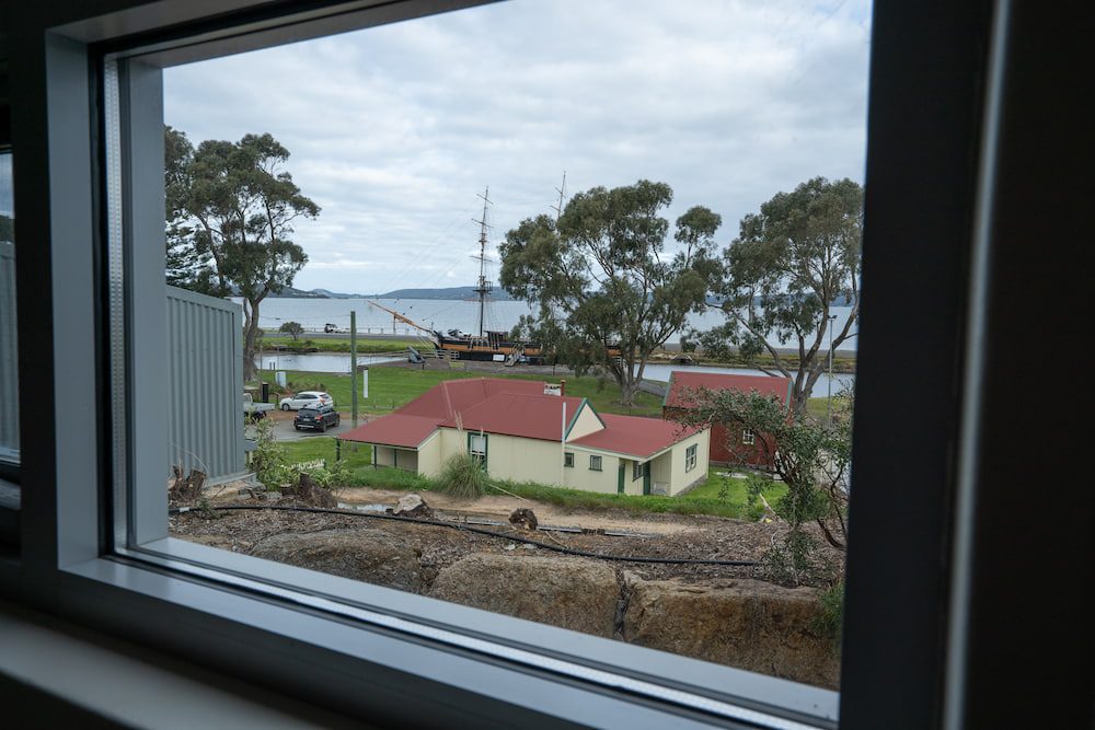 A view to the Amity ship from the window of the second bedroom in the Lockyer Apartment.